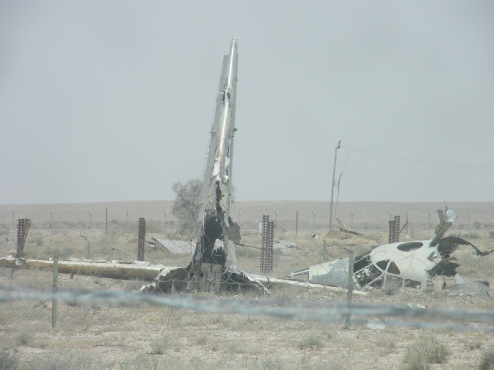 The aircraft graveyard at the edge of the field