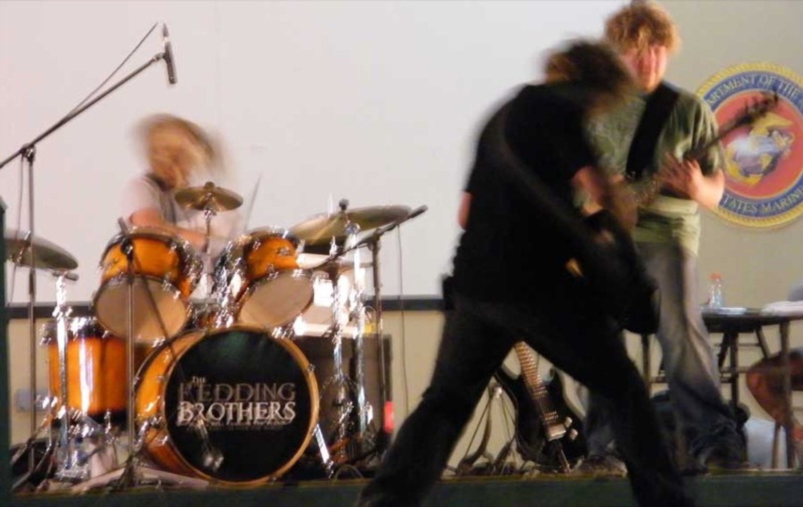 Mid-set, beneath the Marine Corps seal